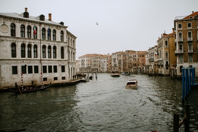 Went boating on the buildings near the surface of the water during the day
